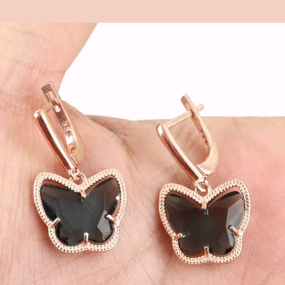 Blue topaz & rose gold butterfly earrings